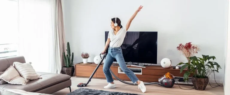 person enjoying chores in room